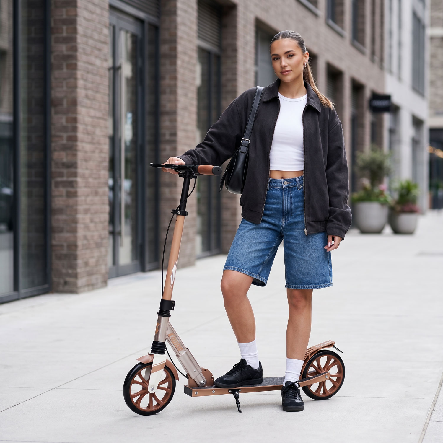 Story GlideX Elite Foldbart Transport Løbehjul – affjedring og håndbremse